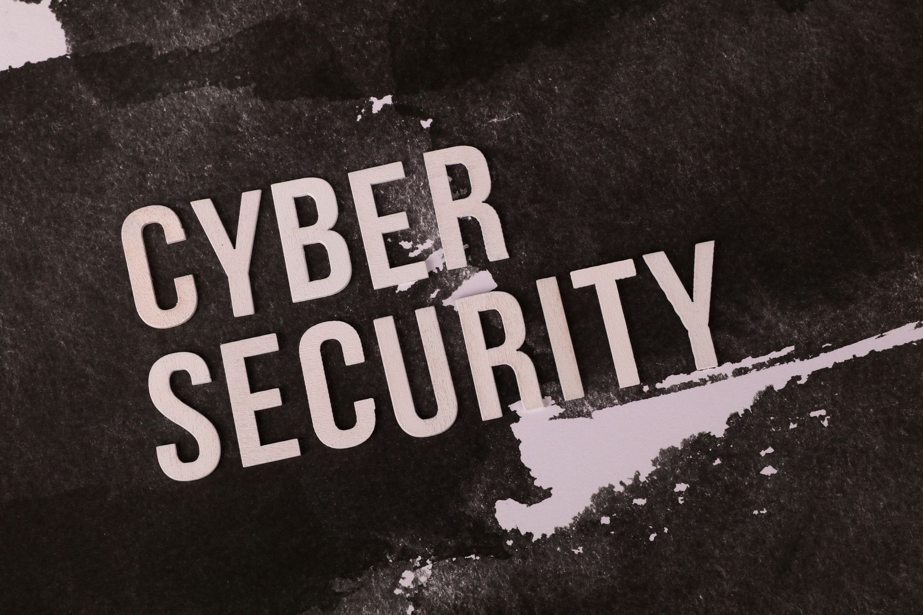 Cyber security concept shown on grunge-style background highlights the importance of digital protection.