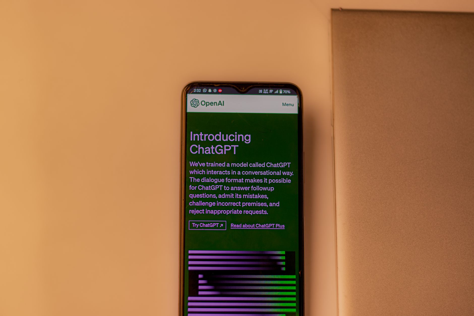 A smartphone showing the ChatGPT interface, emphasizing technology and AI indoors.